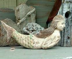 Antique wooden mermaid